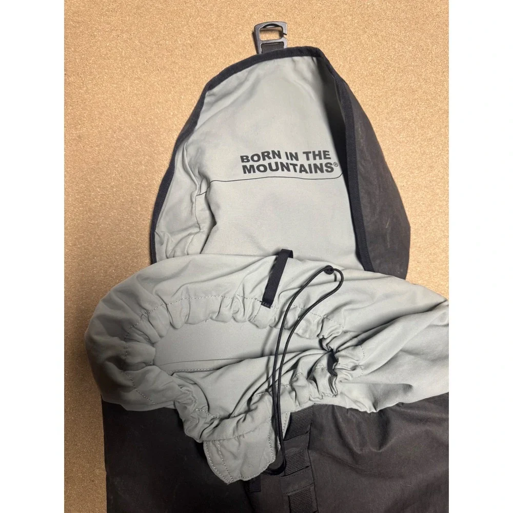 KHUL Black Backpack Born in‎ the Mountains Logo Drawstring Top Flap Closure $200